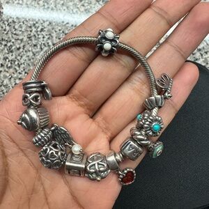PANDORA BRACELET WITH CHARMS